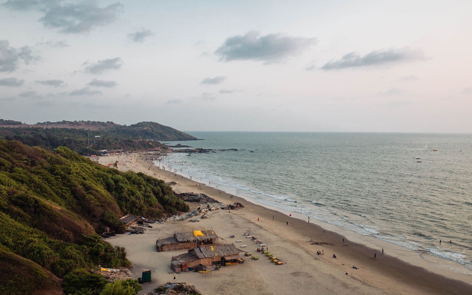 Aerial view of Chapora Beach's palm-fringed coastline, Goa